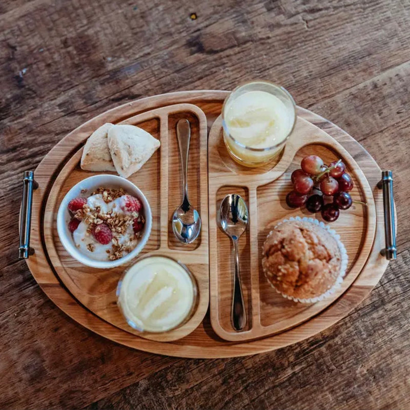 Breakfast tray set up with two place settings