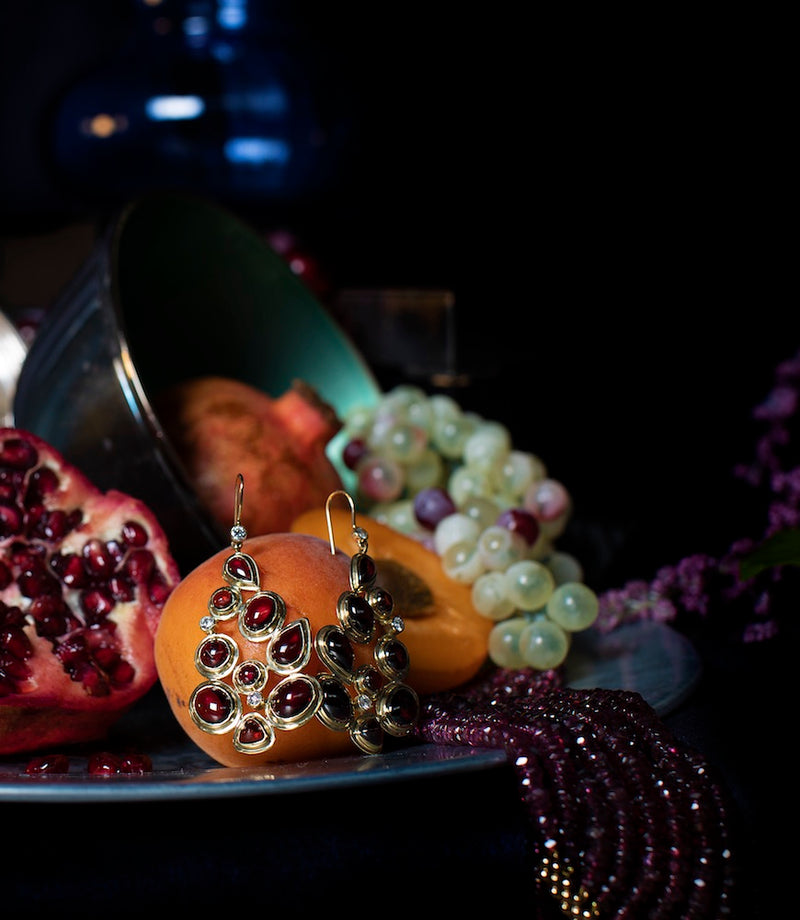 Fruit bowl with garnet mosaic earrings and garnet bracelet