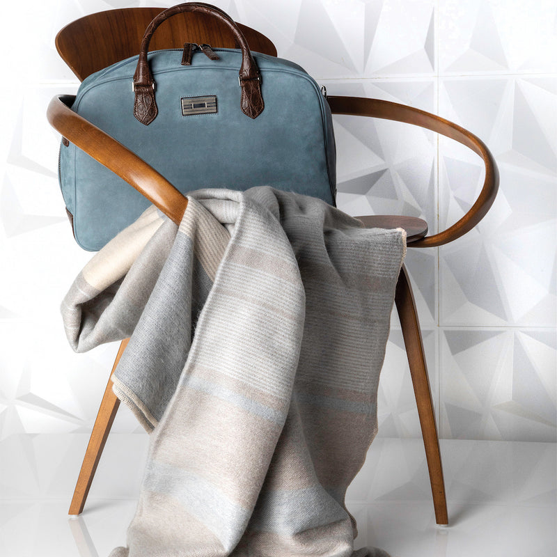 Alpaca throw on chair with blue suede Newport bag