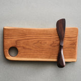 Cheese board with spreader