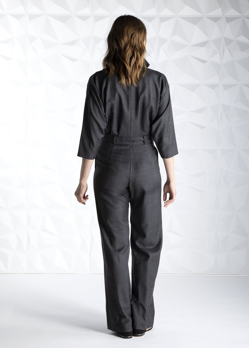Back view of Darby Scott model in charcoal jumpsuit