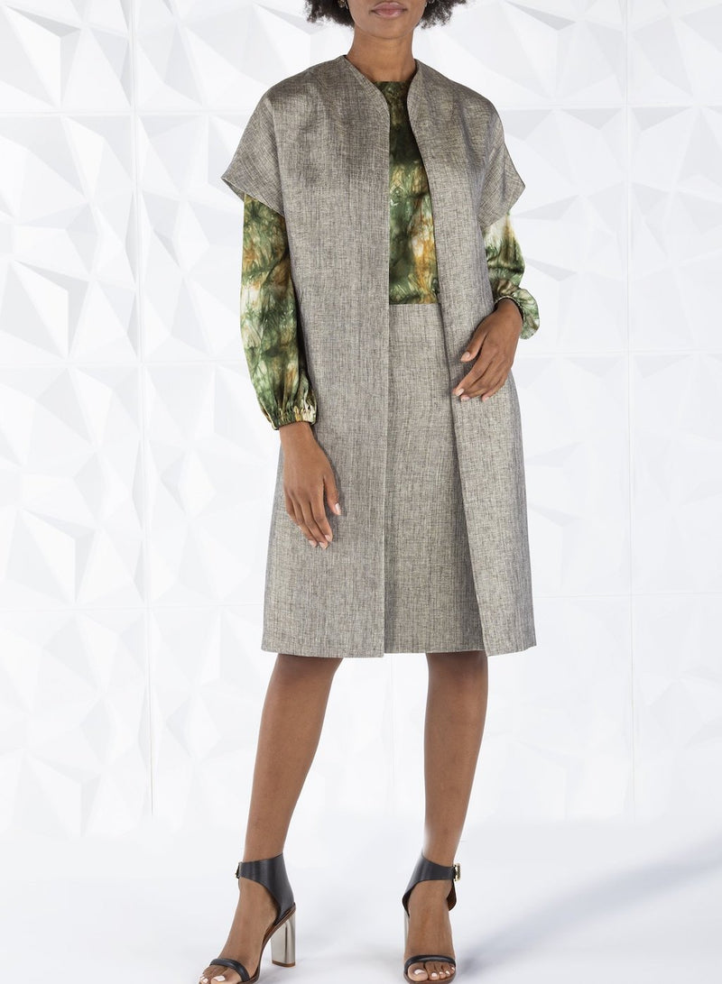 Darby Scott model wearing peppercorn tweed topper coat and pencil skirt.