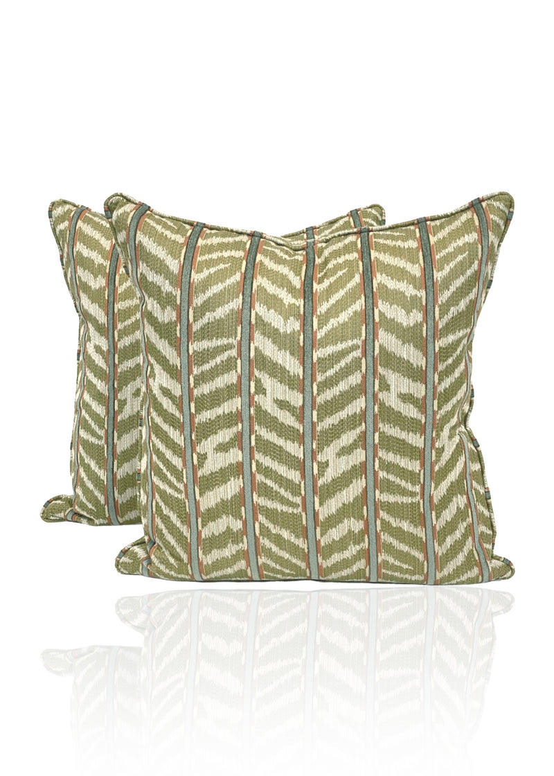 Pair of throw pillows in olive and white chevron pattern 