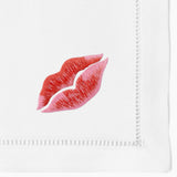 Embroidered red lips on cotton napkin