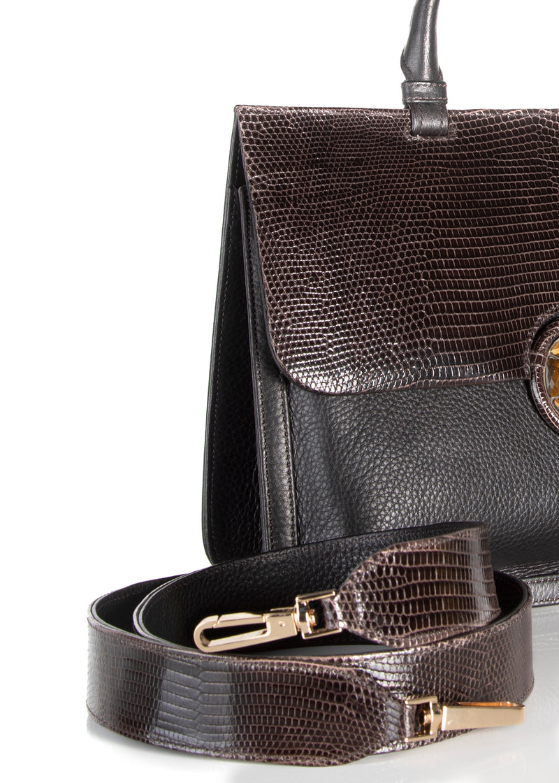 Detail view of strap and side of brown leather and lizard saddle bag - Darby Scott