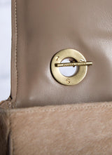 Interior view of handle toggle on tan haircalf Shoulder Bag - Darby Scott