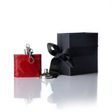 2 ounce flask with slip to add to key chain. shown with gift box