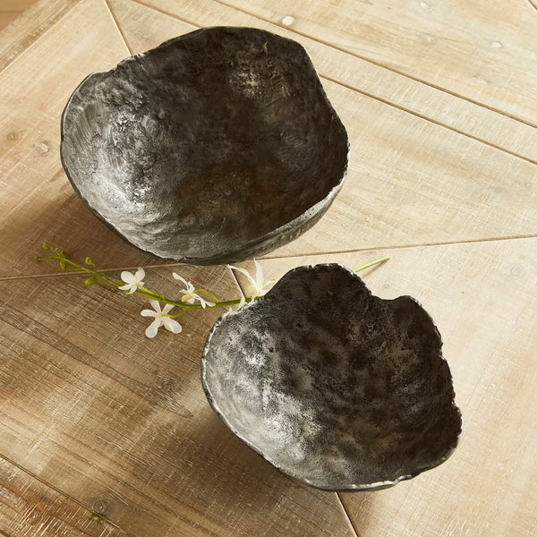 Hand sculpted small and large bowls with uneven edges