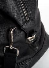 Close up of Strap Link on Black Leather Aspen Travel Bag - Darby Scott