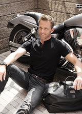 Leather Aspen Travel Bag and model in front of his motorcycle - Darby Scott