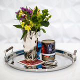 Tray with pitcher, flowers, candle 
